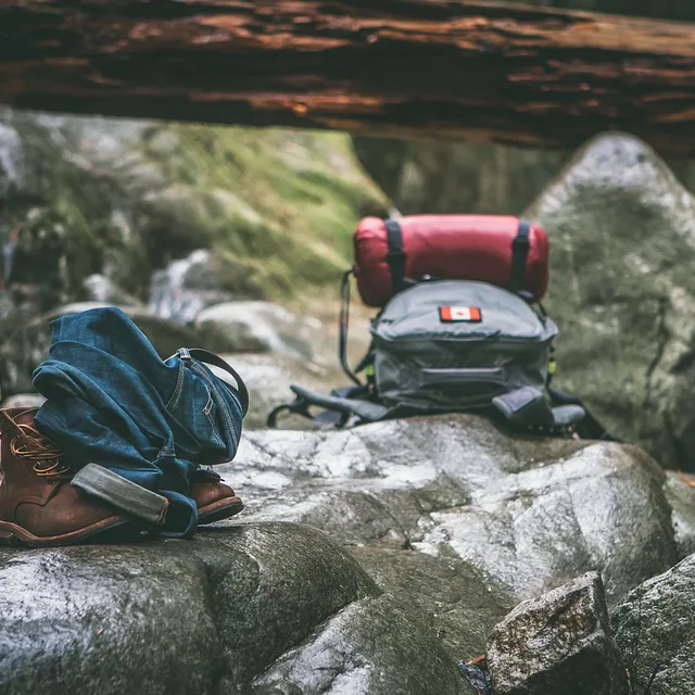 Outdoor camping gear arranged for a TrailForge Gear product display